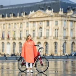 Le Temps Des Grenouilles Poncho De Pluie ADULTE - Coloris Unis 28 Le Temps Des Grenouilles Poncho De Pluie ADULTE - Coloris Unis -Promos Vélo Magasin cape de pluie de couleur pop orange le temps des grenouilles