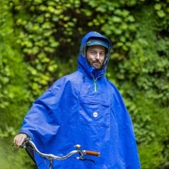 Le Temps Des Grenouilles Poncho De Pluie ADULTE - Coloris Unis 31 Le Temps Des Grenouilles Poncho De Pluie ADULTE - Coloris Unis -Promos Vélo Magasin cape de pluie le temps des grenouilles bleu flashy pop